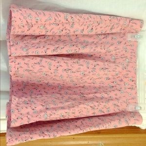 A pink scatter skirt